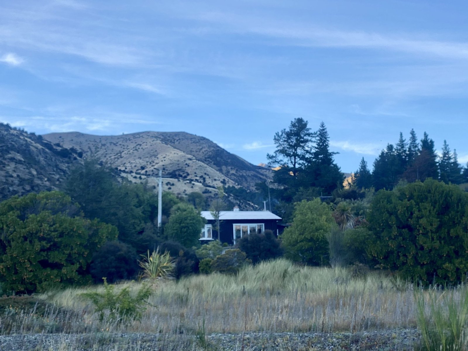 The Black Shack seen from a distance, Lake Hawea