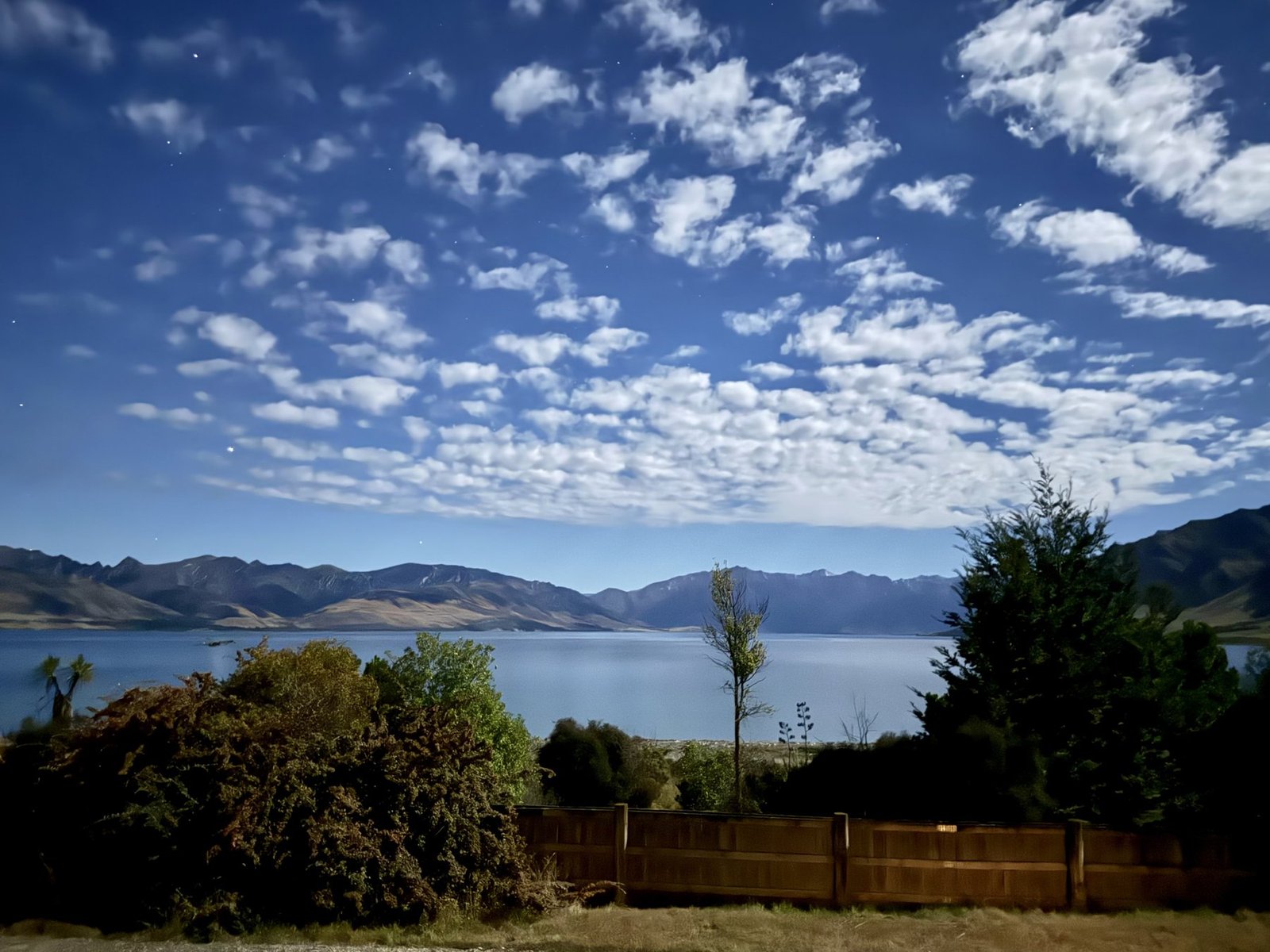 Lake Hawea view with mountains at dusk, near The Black Shack