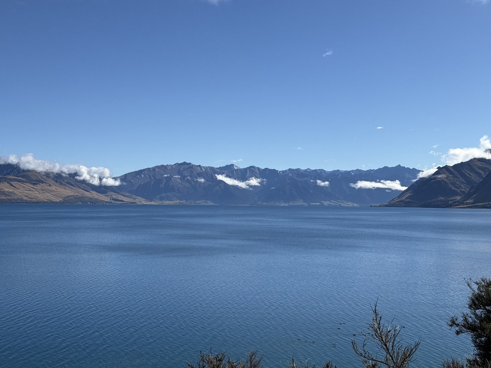 Lake Hawea and mountains with clouds
