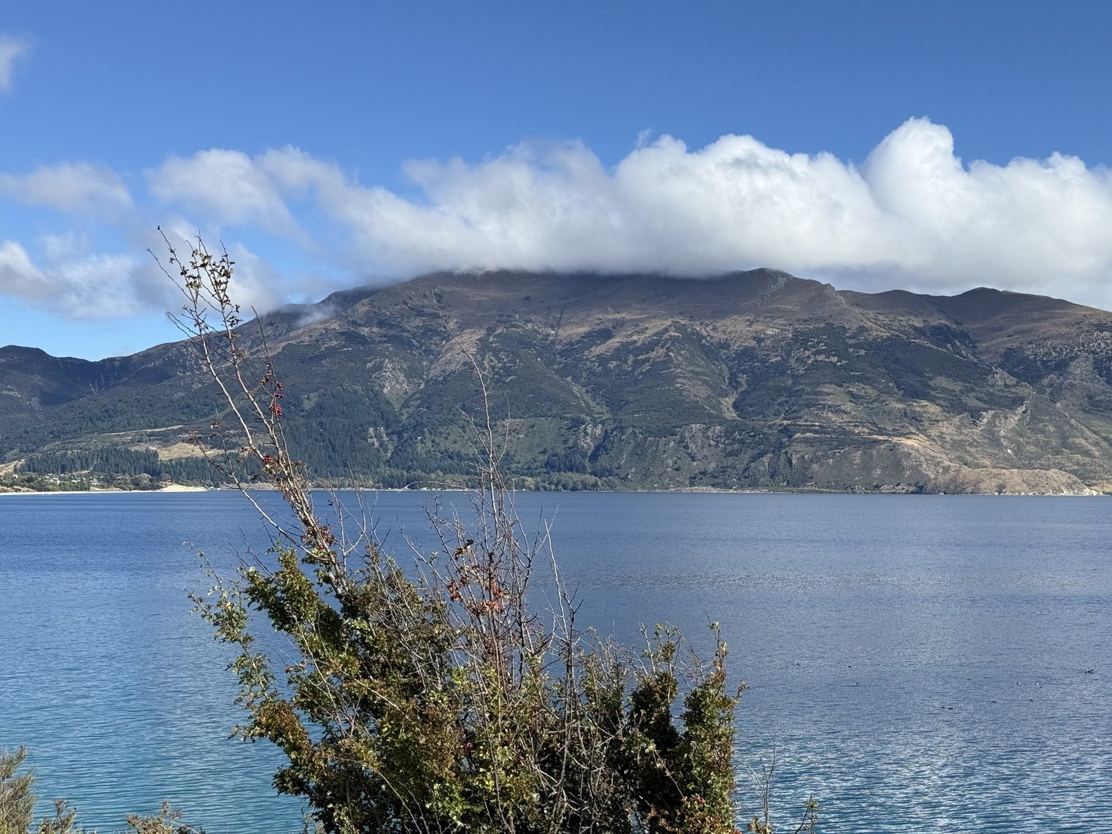 Lake Hawea with cloud-covered mountains